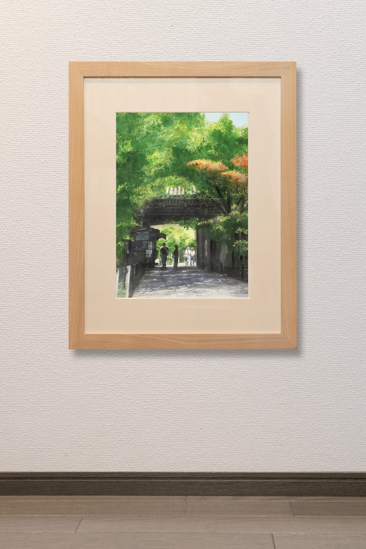 The temple gate and sunlight filtering through the trees